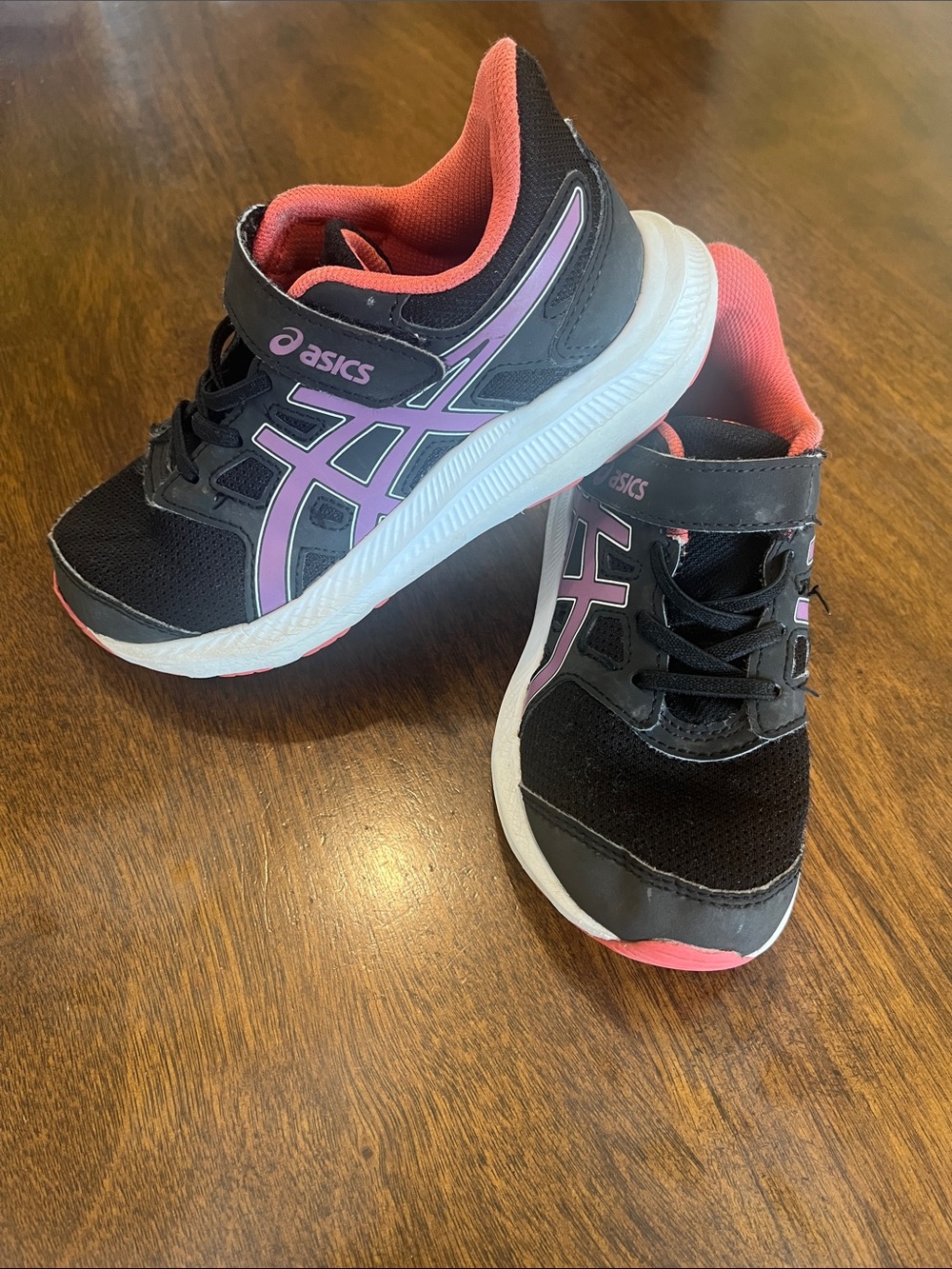 EUC ASICS size 12 kids black, pink, and purple sneakers